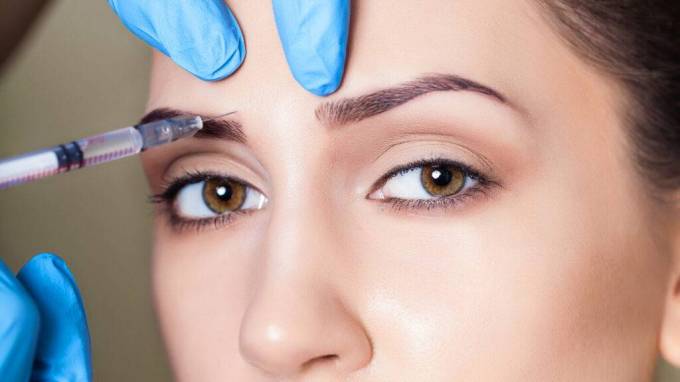 How does aging contribute to the need for a brow lift procedure?