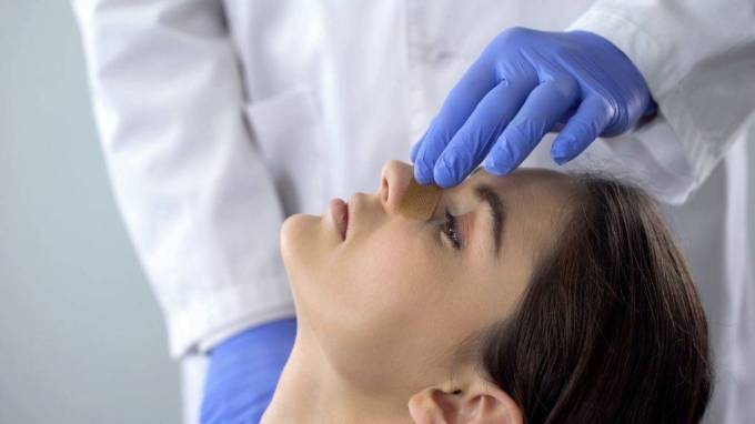 How is Rhinoplasty performed by a surgeon?