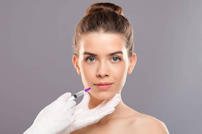 How does jawline filler influence facial proportions?